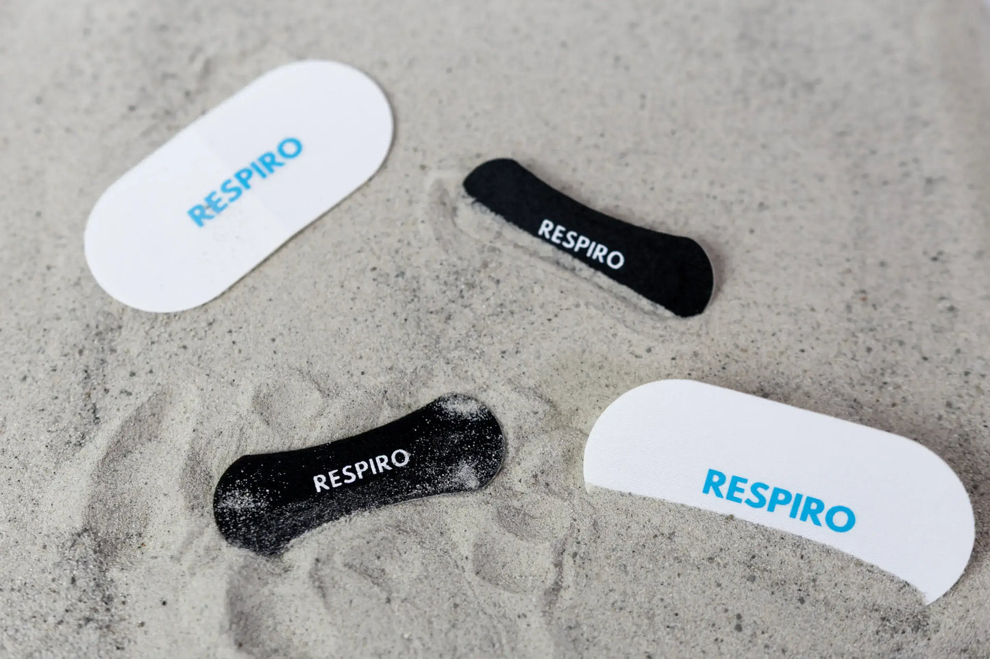 Respiro nose strips and mouth tapes on sand