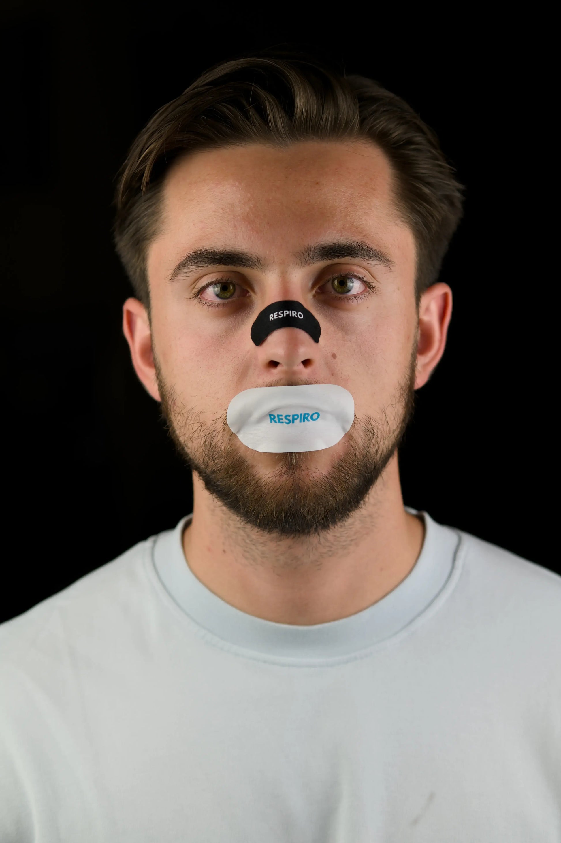 Man with Respiro nose strip and hydrating mouth tape applied