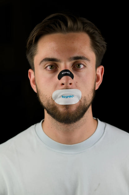 Man with Respiro nose strip and hydrating mouth tape applied