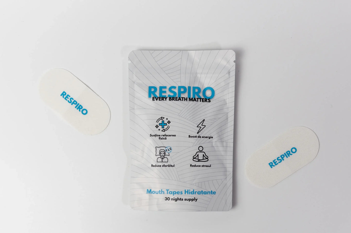 Respiro Hydrating Mouth tapes package next to the products layed down