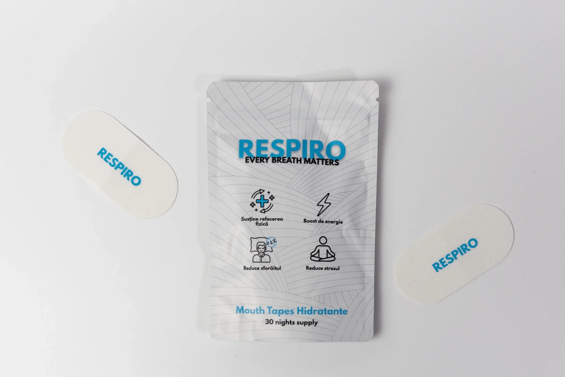Respiro Hydrating Mouth tapes package next to the products layed down